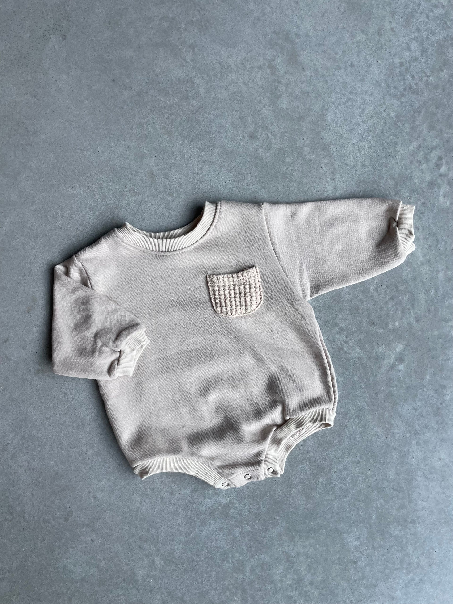 Pocket sweater romper