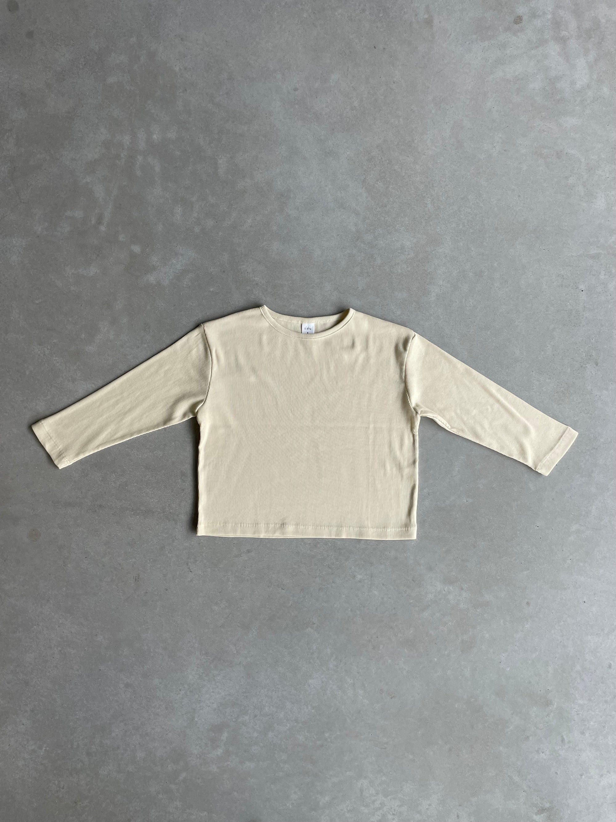 Fijngeribbeld stretchy T-shirt met lange mouwen - crème