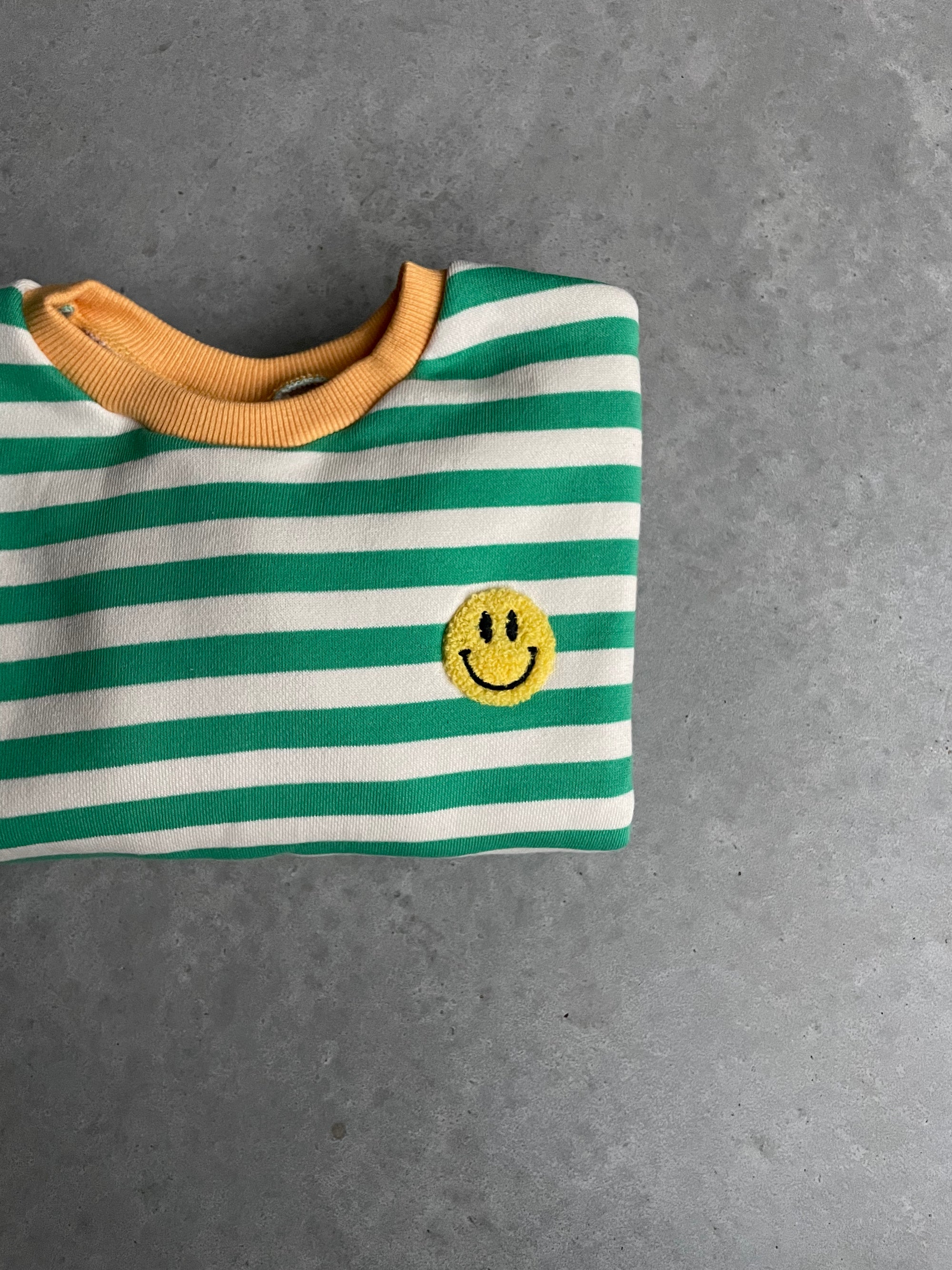 Striped smiley sweater - groen