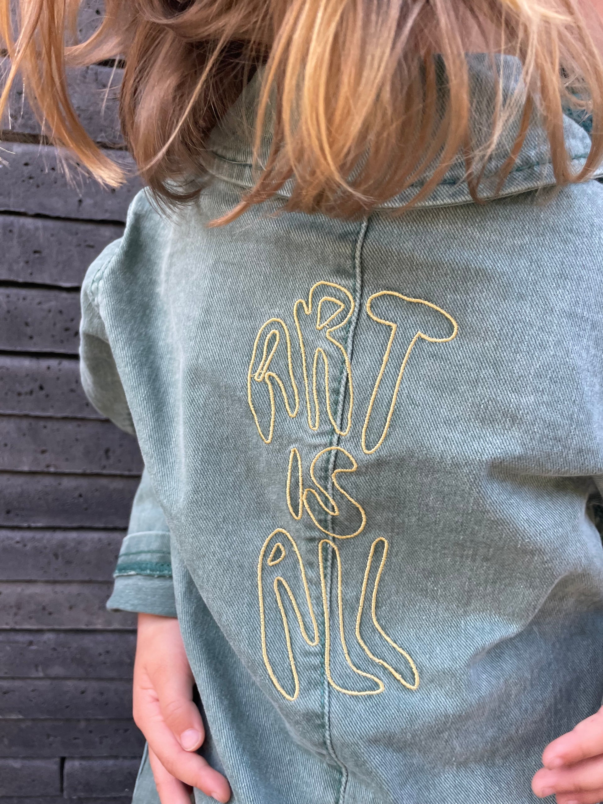 Green denim boilersuit