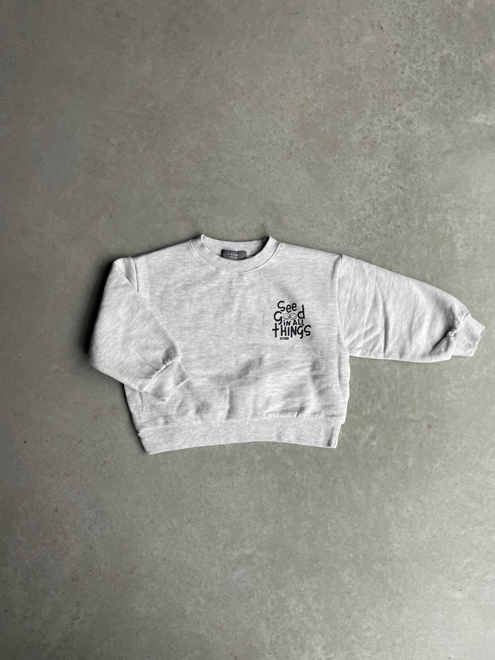 Oversized smile quote sweater