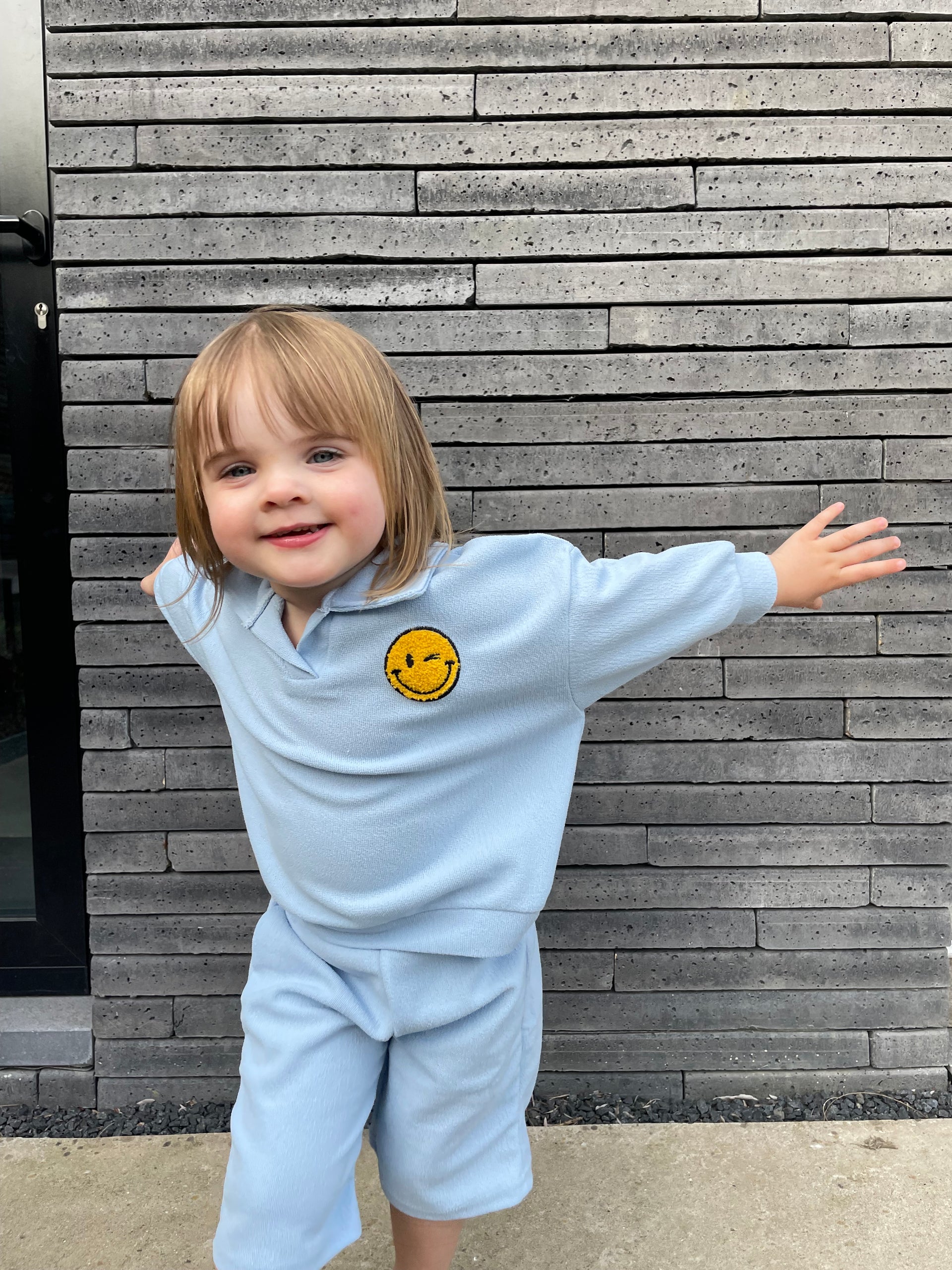 Col setje met geborduurde smiley