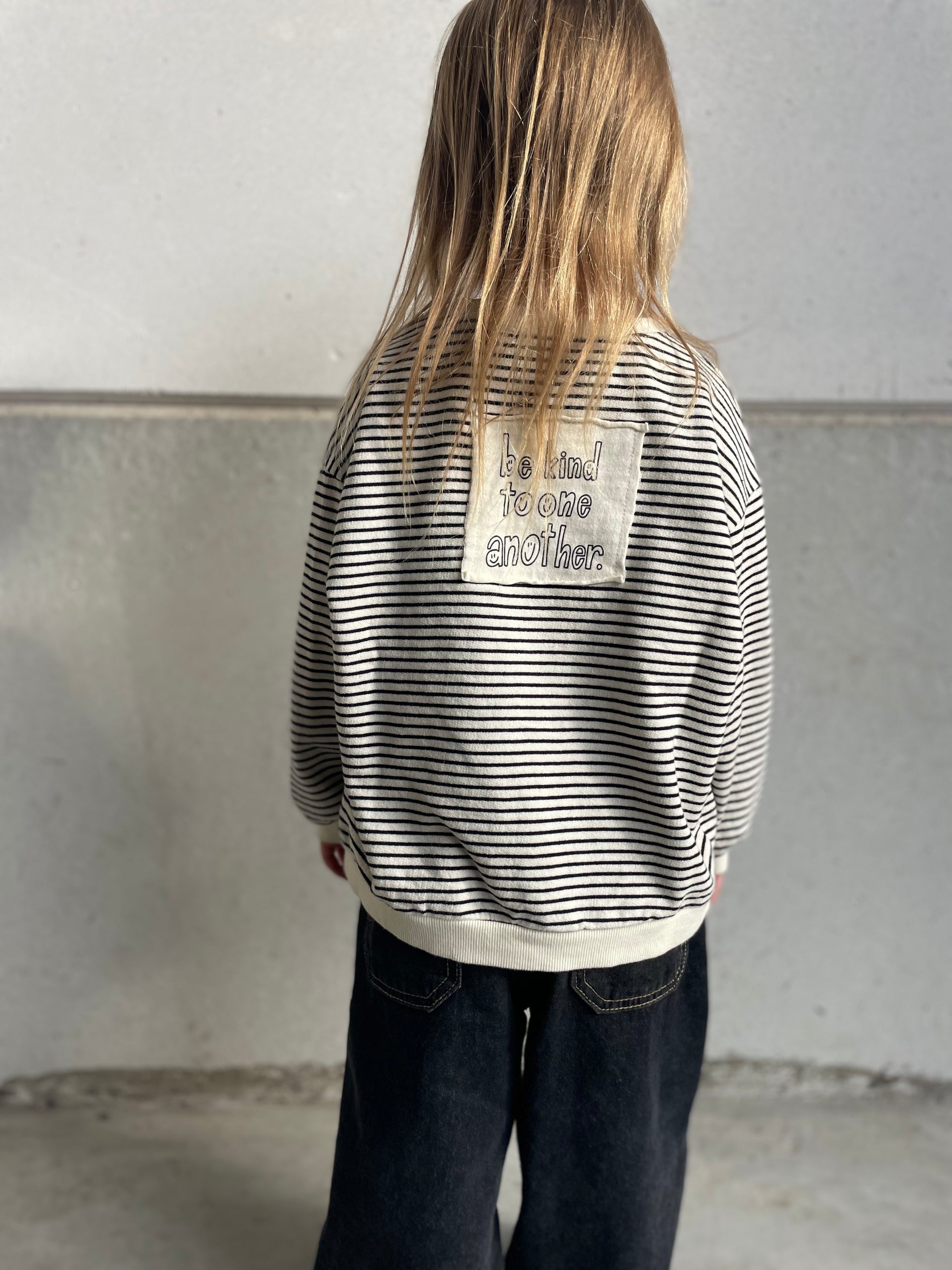 Oversized striped patch quote sweater