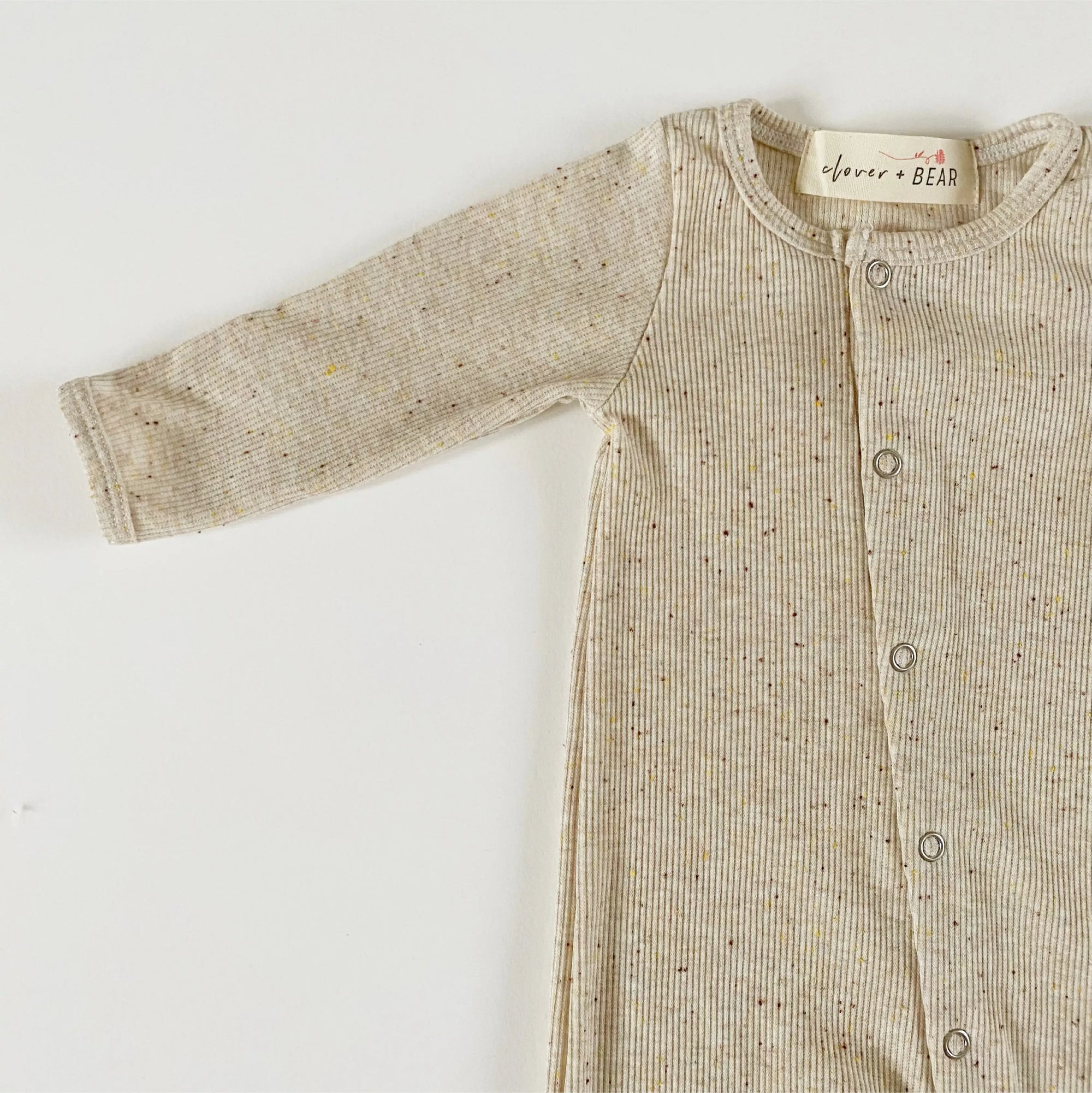 Speckled playsuit with feet